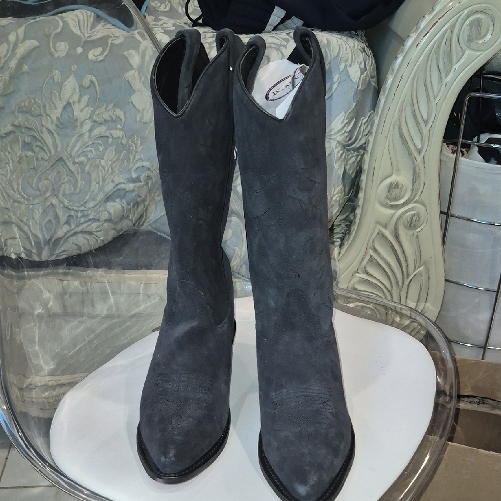 A Pair Of Blackish Gray Cow Girl Boots.